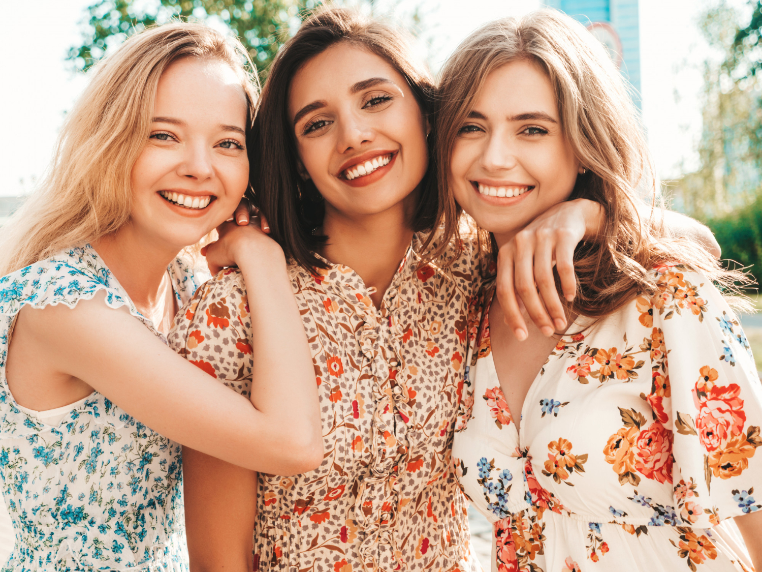 three beautiful smiling girls trendy summer sundress posing street Studio Videochat București